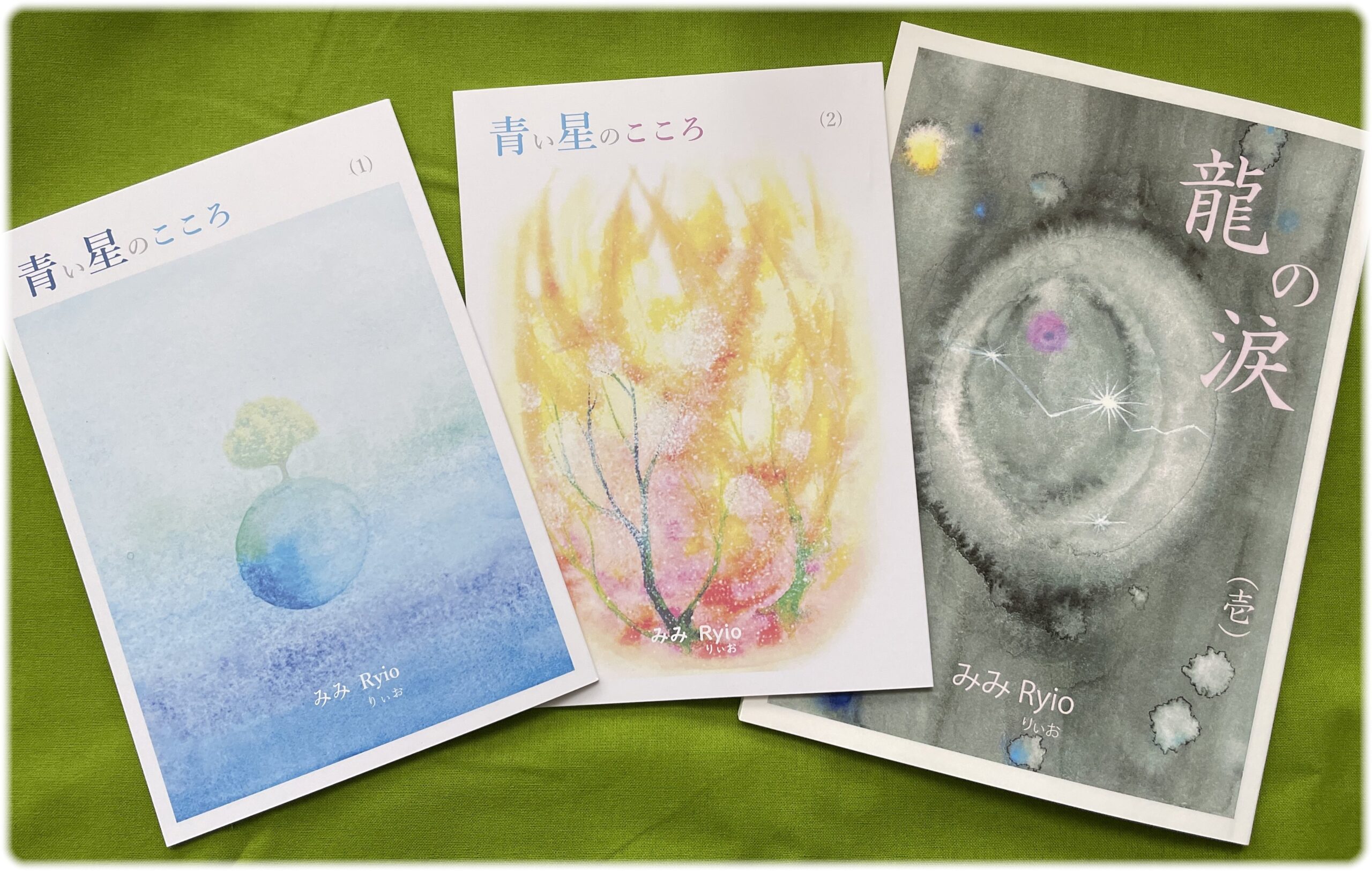 An open book lies on the grassy field with a leaf, evoking relaxation and summer reading vibes.